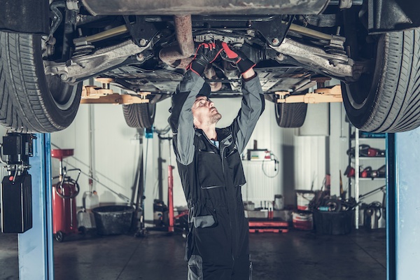 Mechanic Working on Drivetrain | Rev Limit Auto Center in Kapolei, HI